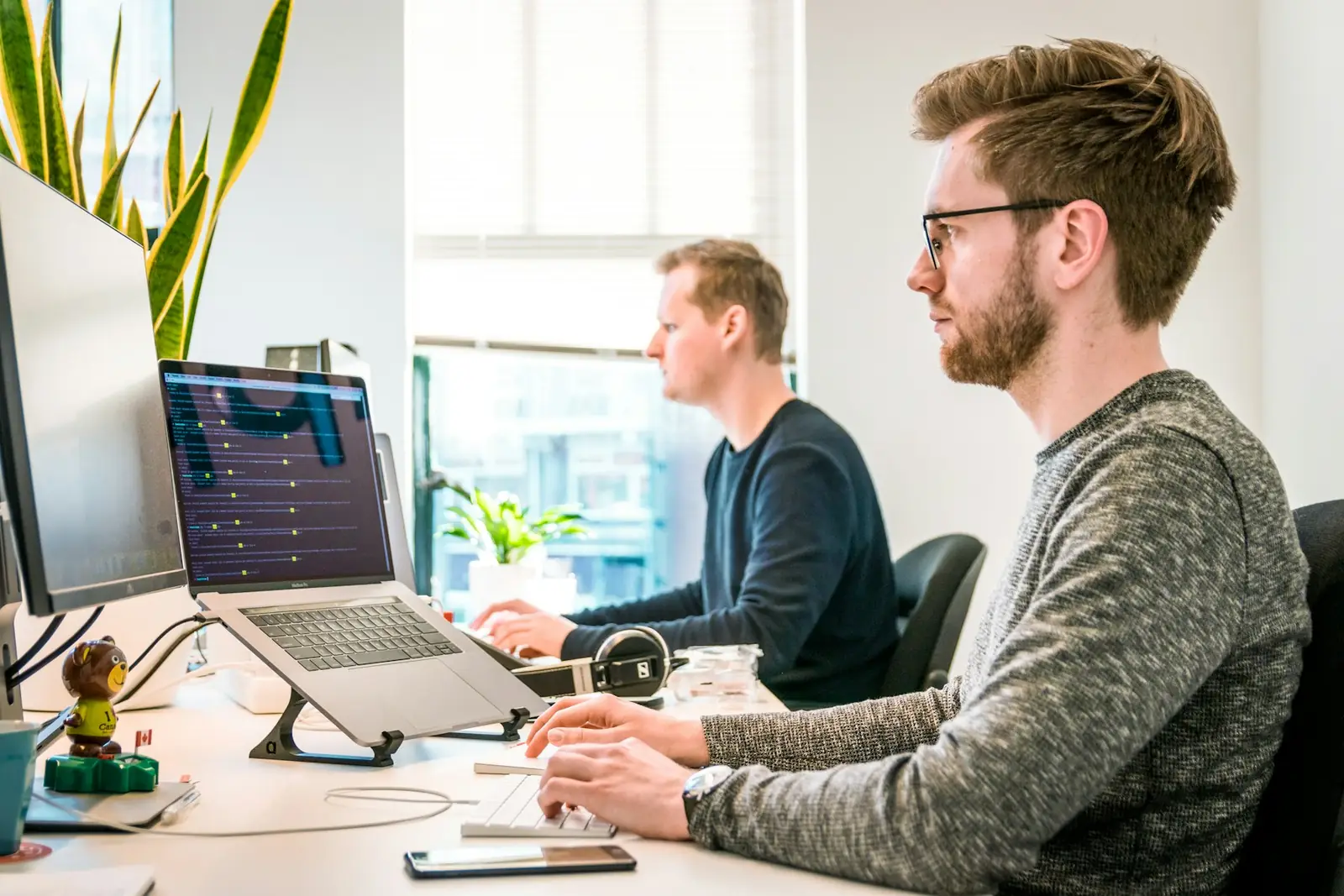 Engineer building software at a workstation